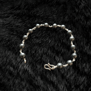 Eternal Strength: Hematite Bead Bracelet with Classic Silver Knot